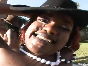 Meet two sensational ebony sluts wearing black boots and big hats. They are riding and sucking their lovers' white cocks next to the pool.