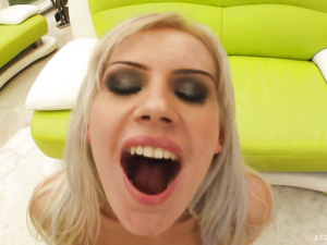 Juicy blonde wearing black stockings is fucking wildly with three brutal men. They are penetrating her sweet holes on the floor and on the green sofa.