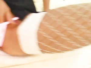 Lovely model having blonde hair and wearing sexy white fishnet is practicing wild solo. She is riding huge glass dildo with pleasure.