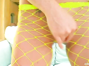 Horny blonde wearing yellow fishnet is going to show her wild solo skills on camera. Watch her fingering and toying her juicy holes wildly.