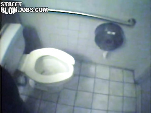 Enter public toilet and see sexy blonde sitting on her knees. She is deepthroating her man's aggregate and presenting him with handjob.