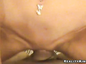 Watch sexy woman with pierced nipples fucking passionately with her BF. She is getting banged with his cock and her fake boobs are shaking.