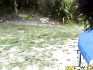 Say Hi to lovely brunette wearing black sunglasses and sunbathing outdoor. Her partner is pushing his penis deep in her tanned holes.