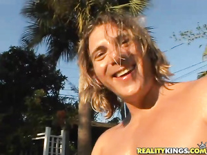 Long-haired playboy was pleased to fuck two voluptuous ladies' pussies outdoors under the rays of setting sun.