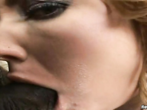 Watch strong chocolate man sharing two sexy chicks with his white friend. The men are presenting ladies with great double penetration.