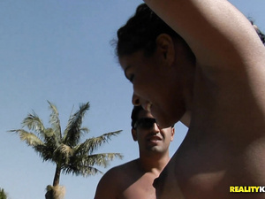 Fall in love with slutty brunette practicing deep anal fuck with her lover outdoor. She is also getting her wet pussy drilled and tasting his dick.