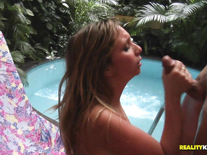 Welcome to wild pool party this strong guy is enjoying with his blonde girlfriend. The chick is taking off her colorful dress and being banged into her ass.